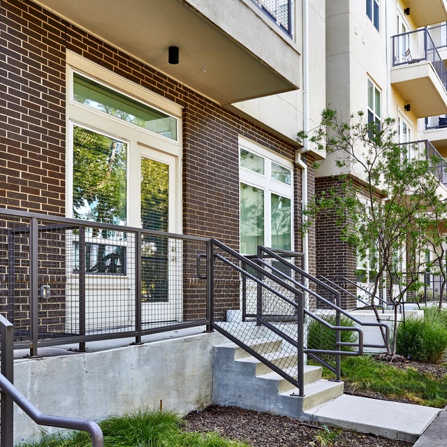 Community exterior with private entrances at the Standard at Cityline near Dallas