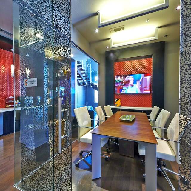 Conference room with a large table inside the clubhouse at the Standard at Cityline