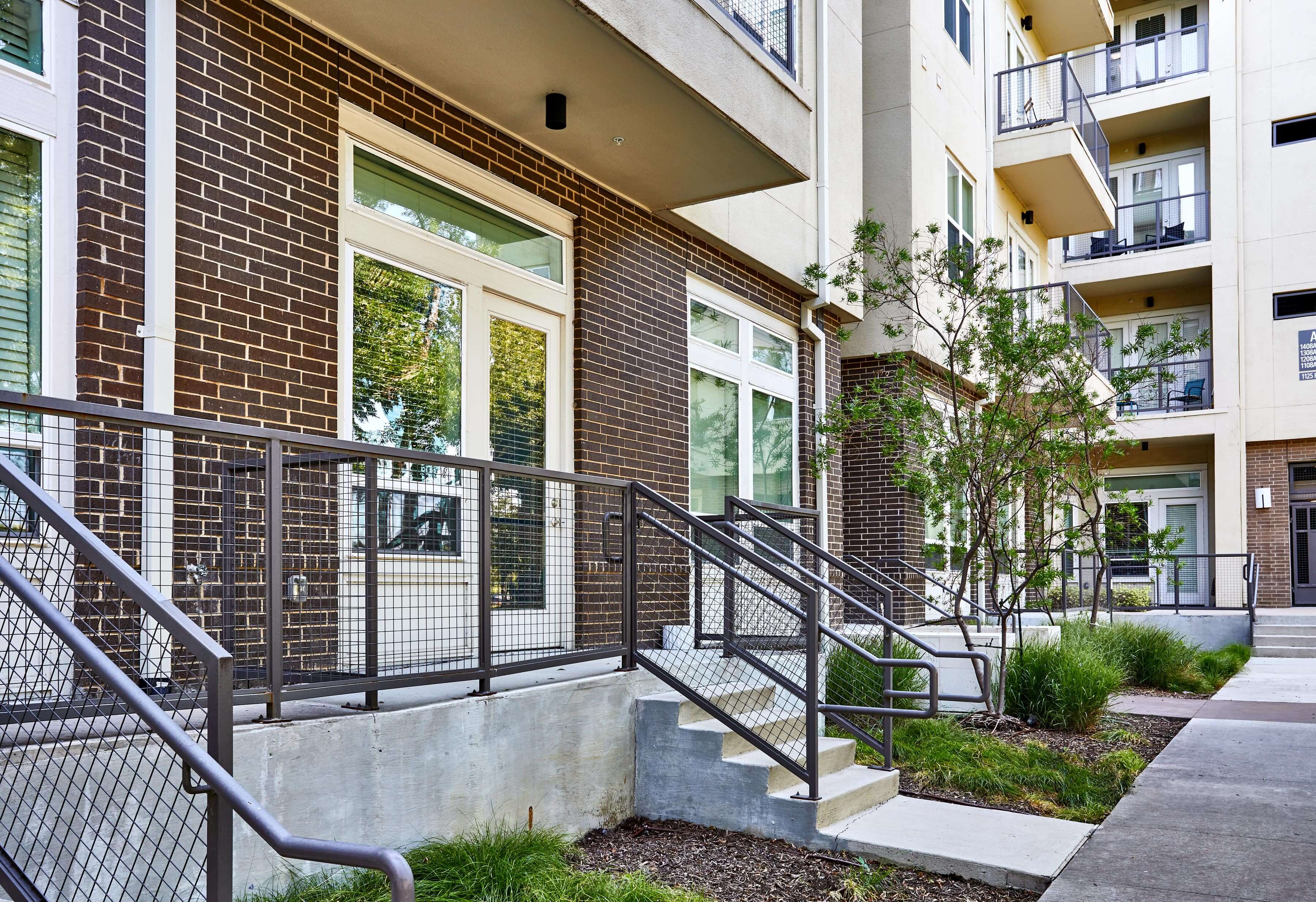 Community exterior with private entrances at the Standard at Cityline near Dallas