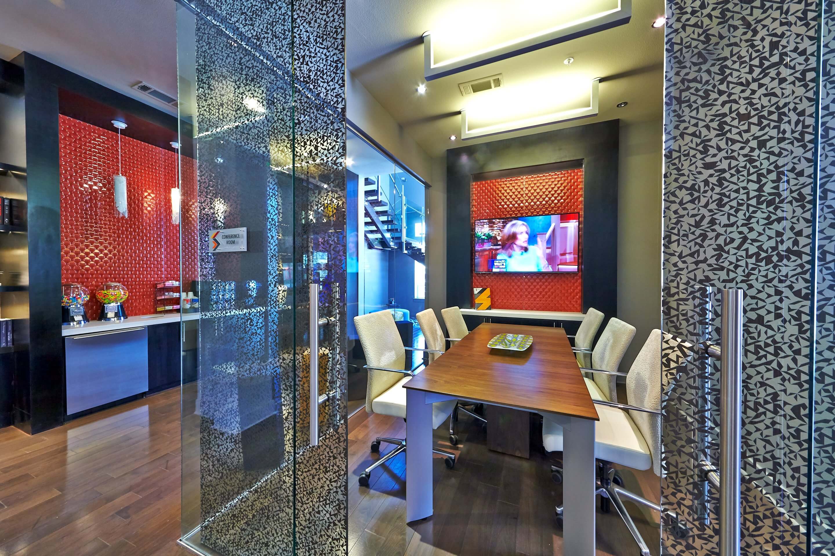 Conference room with a large table inside the clubhouse at the Standard at Cityline